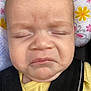 Zailee is registered to the contest to win money with this photo: baby, face, closed_eyes, grimace, yellow_clothing, car_seat, harness, infant, skin, head, expression, child, cute, young, portrait, closeup, person, seatbelt, fabric, pattern
