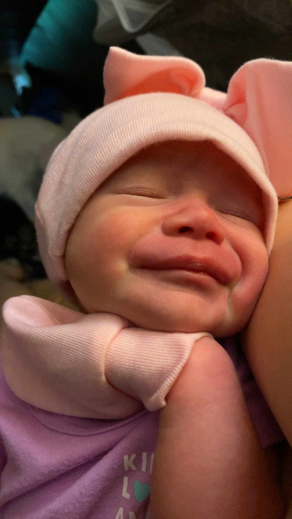 Zailee is registered to the contest to win money with this photo: baby, newborn, sleeping, pink_hat, bow, cute, smile, infant, soft, closeup, face, child, peaceful, warm, snuggle, clothing, skin, portrait, newborn_clothing, headgear
