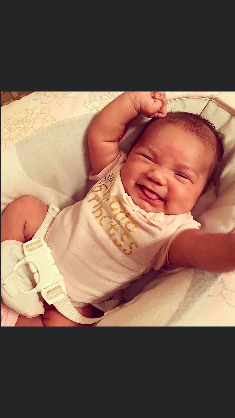 Amelia joined the competition — help win amazing prizes! baby, baby_sleeping, baby_toddler_clothing, bedtime, cheek, child, comfort, eyebrow, flash_photography, gesture, happy, linens, lip, mouth, nose, person, skin, sleeve, smile, thumb