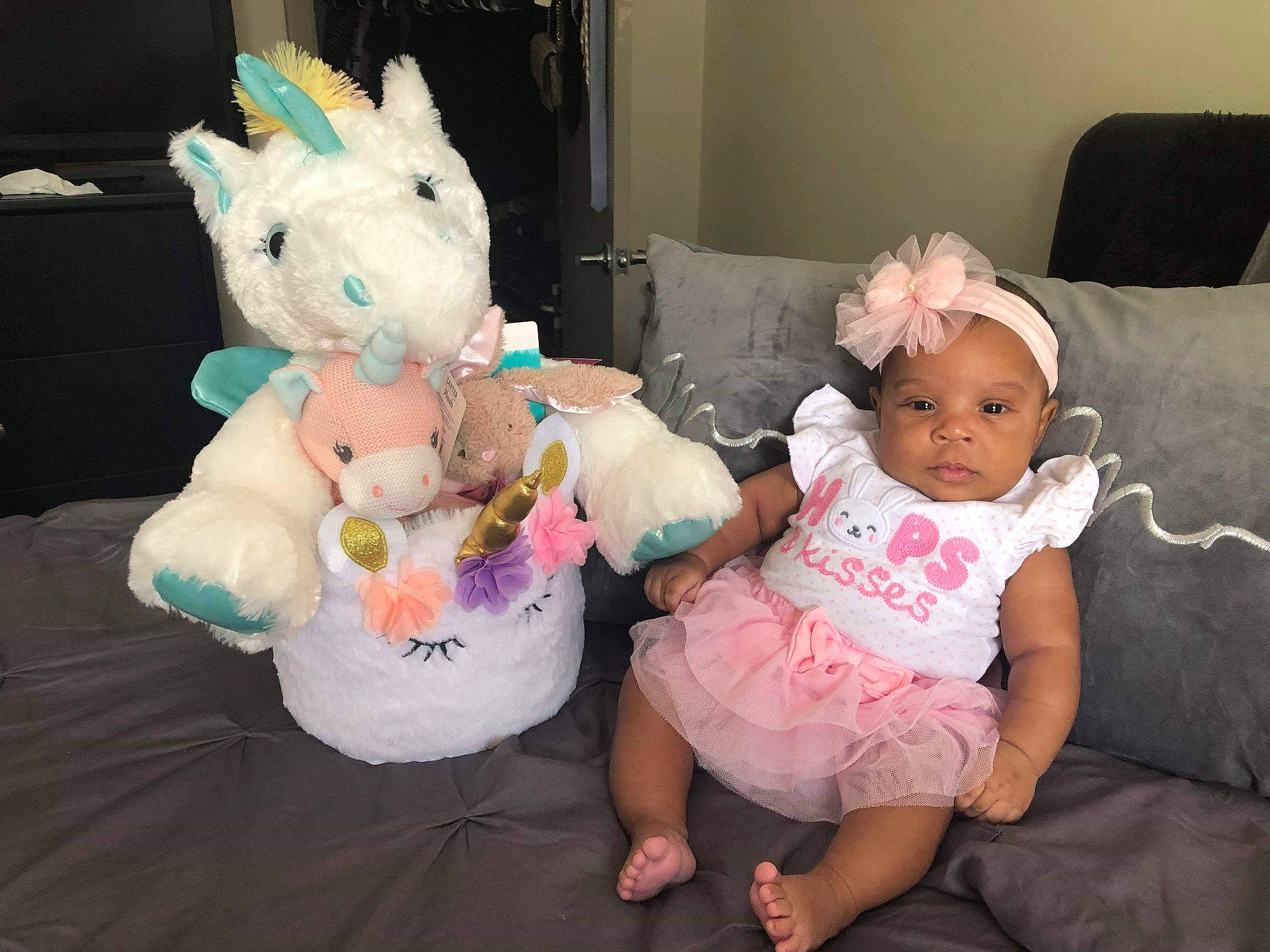 Aliza is registered to the contest to win money with this photo: baby, child, ear, easter, easter_bunny, eye, fun, happy, holiday, leg, person, pink, play, plush, room, skin, smile, stuffed_toy, toddler, toy