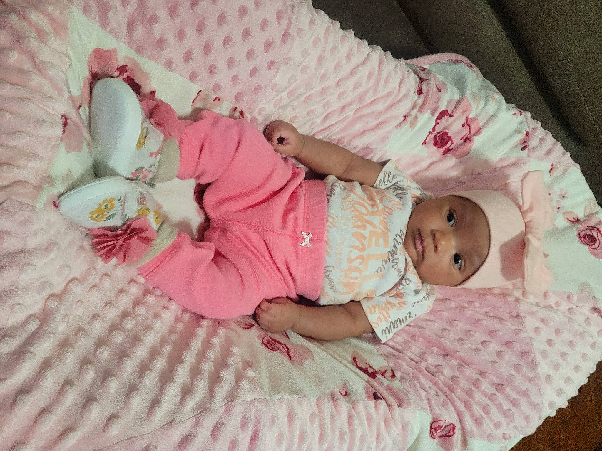 Nyelle joined the competition — help win amazing prizes! arm, baby, baby_products, baby_toddler_clothing, child, clothing, comfort, dress, hand, headgear, headwear, human_body, linens, pattern, person, pink, room, sitting, skin, sleeve