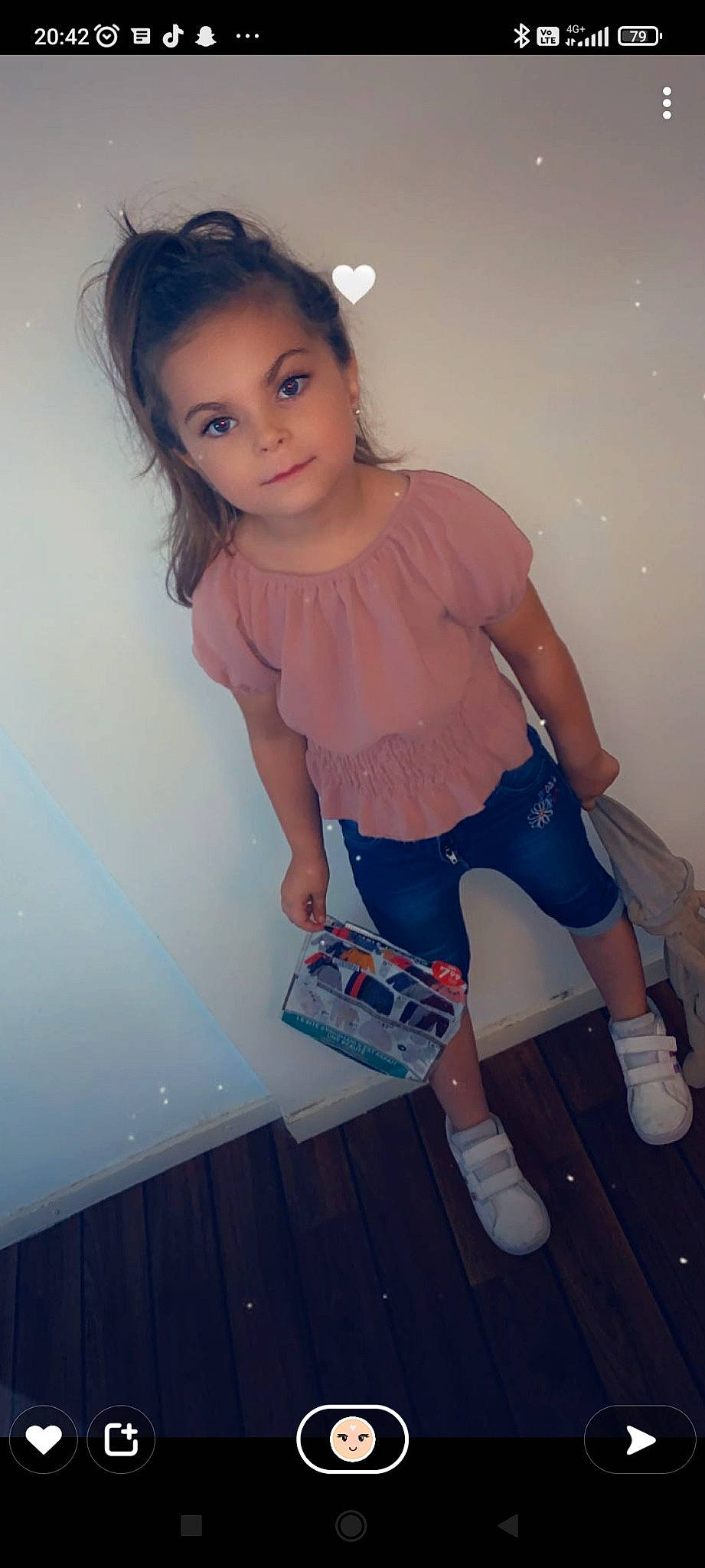 Nélya participe au concours pour gagner de l'argent avec cette photo : baby_toddler_clothing, dress, eye, fashion, flash_photography, footwear, hairstyle, happy, head, joint, knee, leg, person, pink, shoe, shorts, shoulder, skin, standing, thigh