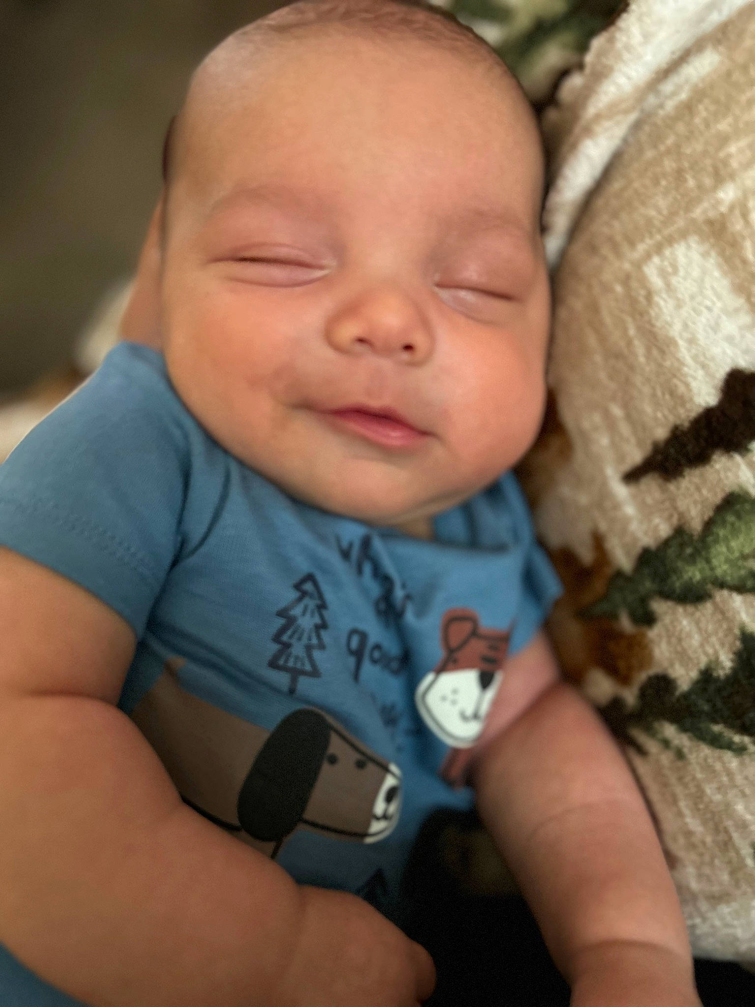 Gage is registered to the contest to win money with this photo: baby, baby_toddler_clothing, cheek, child, chin, comfort, face, facial_expression, finger, grass, happy, mammal, mouth, nose, person, skin, sleeve, smile, thumb, toddler