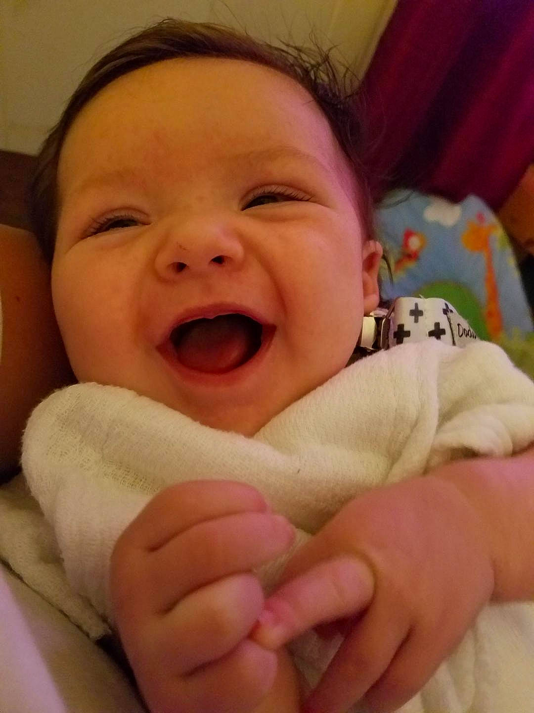 Vance is registered to the contest to win money with this photo: baby, baby_making_funny_faces, bedtime, birth, cheek, child, chin, face, facial_expression, finger, hand, happy, head, laugh, lip, mouth, nose, person, skin, smile