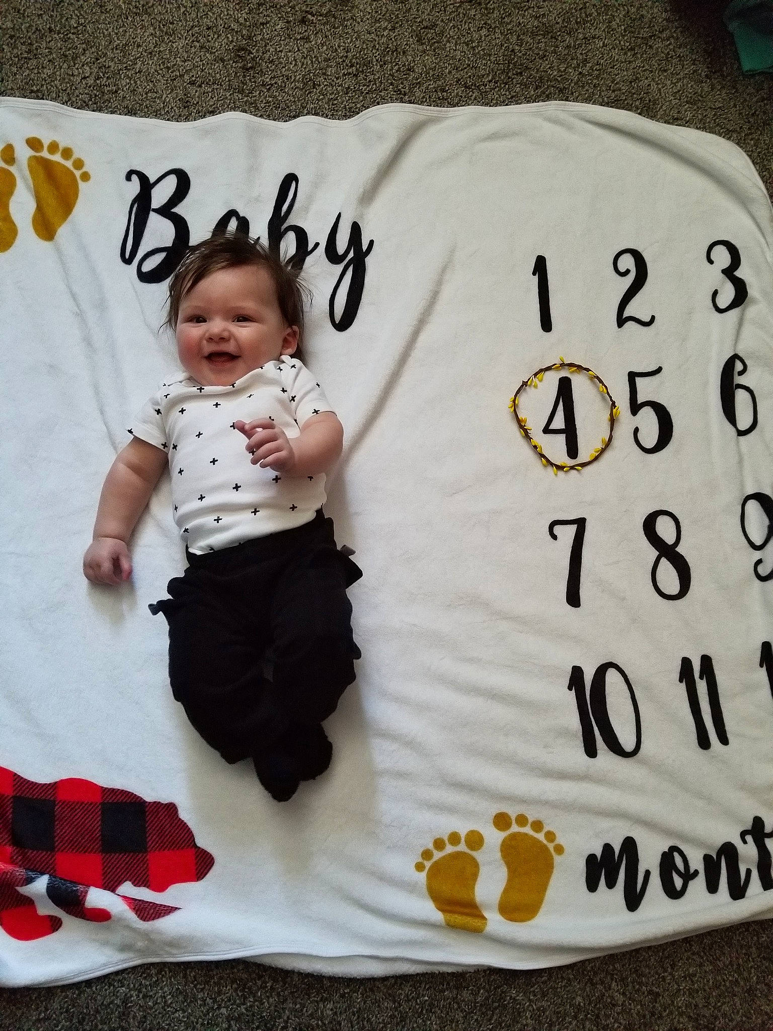 Vance is registered to the contest to win money with this photo: baby, baby_toddler_clothing, child, linens, person, sleeve, t_shirt, textile, toddler