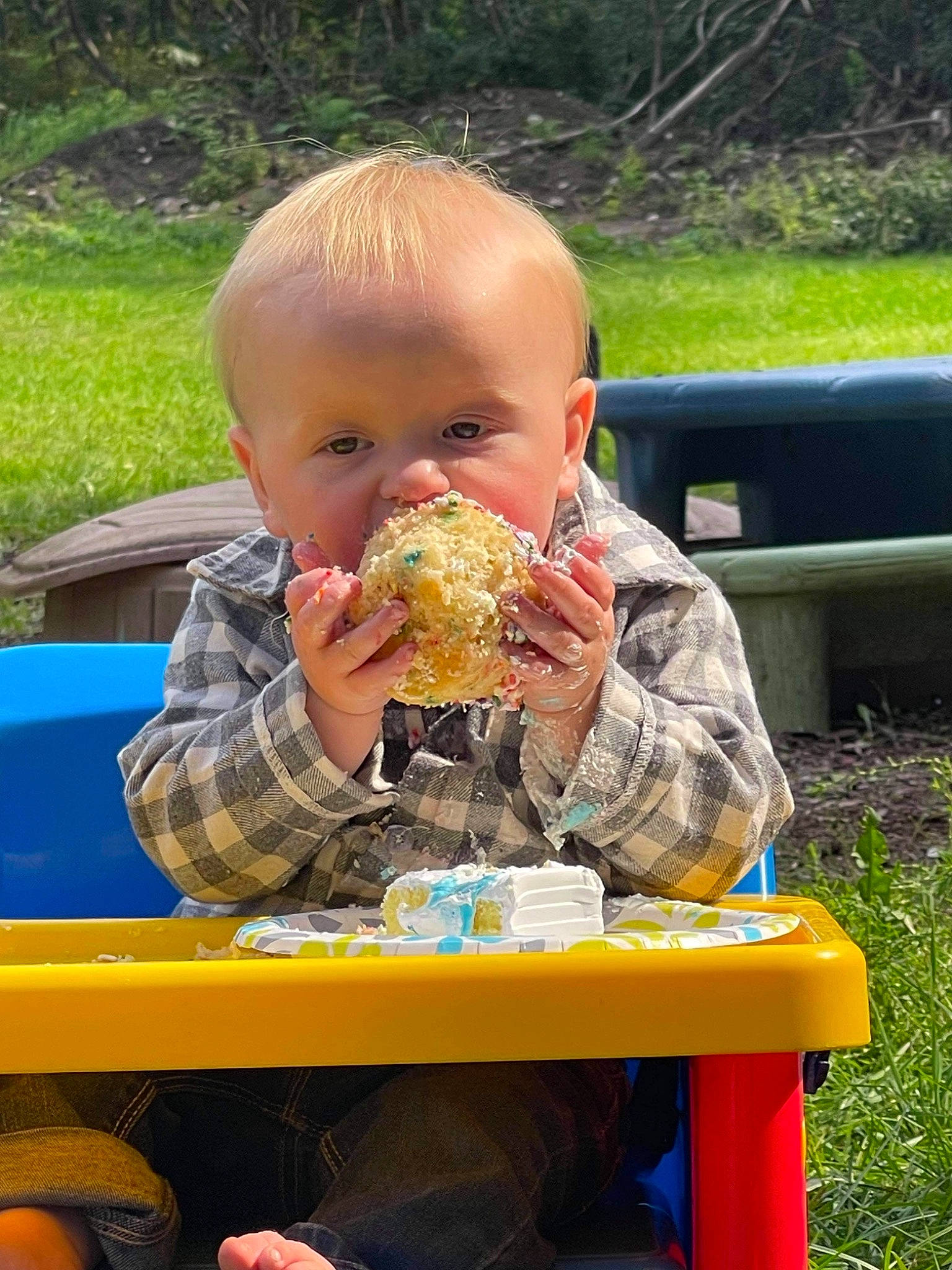 Leeland joined the competition — help win amazing prizes! baby, baby_toddler_clothing, biting, car, child, cuisine, eating, food_craving, fun, grass, grass_family, head, junk_food, leisure, mouth, person, plant, recreation, sharing, sitting