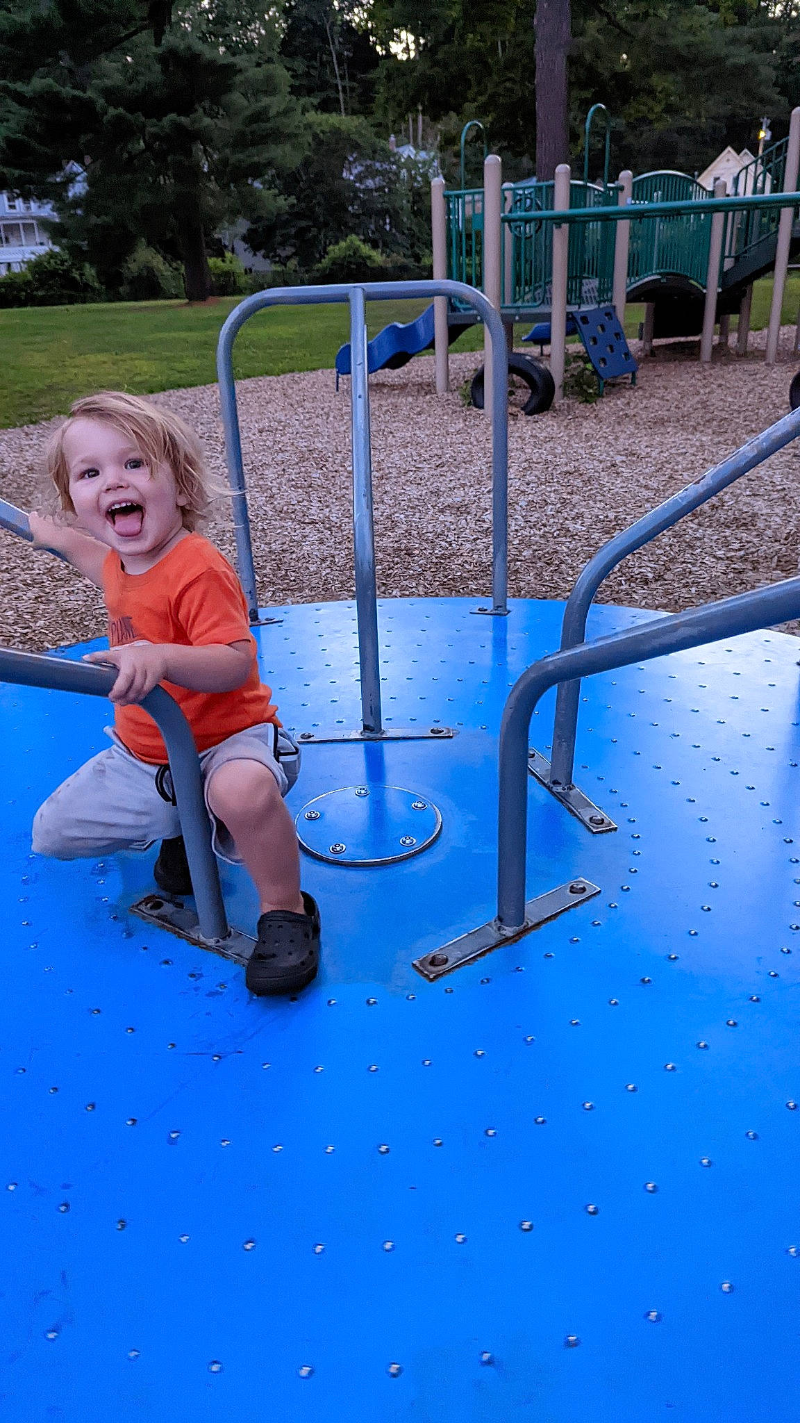 Brycen joined the competition — help win amazing prizes! baby_toddler_clothing, blue, child, chute, city, electric_blue, flooring, fun, gas, grass, leisure, outdoor_play_equipment, person, play, playground, playground_slide, recreation, smile, swing, toddler