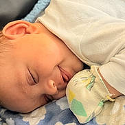 Messiah joined the competition — help win amazing prizes! baby, sleeping, face, mitten, blanket, soft, clothing, infant, peaceful, closeup, cute, rest, cozy, child, portrait, skin, head, mouth, hand, nap