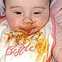 Skyler joined the competition — help win amazing prizes! baby, infant, bib, food_stain, messy, face, close_up, feeding, drool, pink_clothing, cheeks, blanket, portrait, cute, stain, napkin, mouth, eyes, skin, newborn