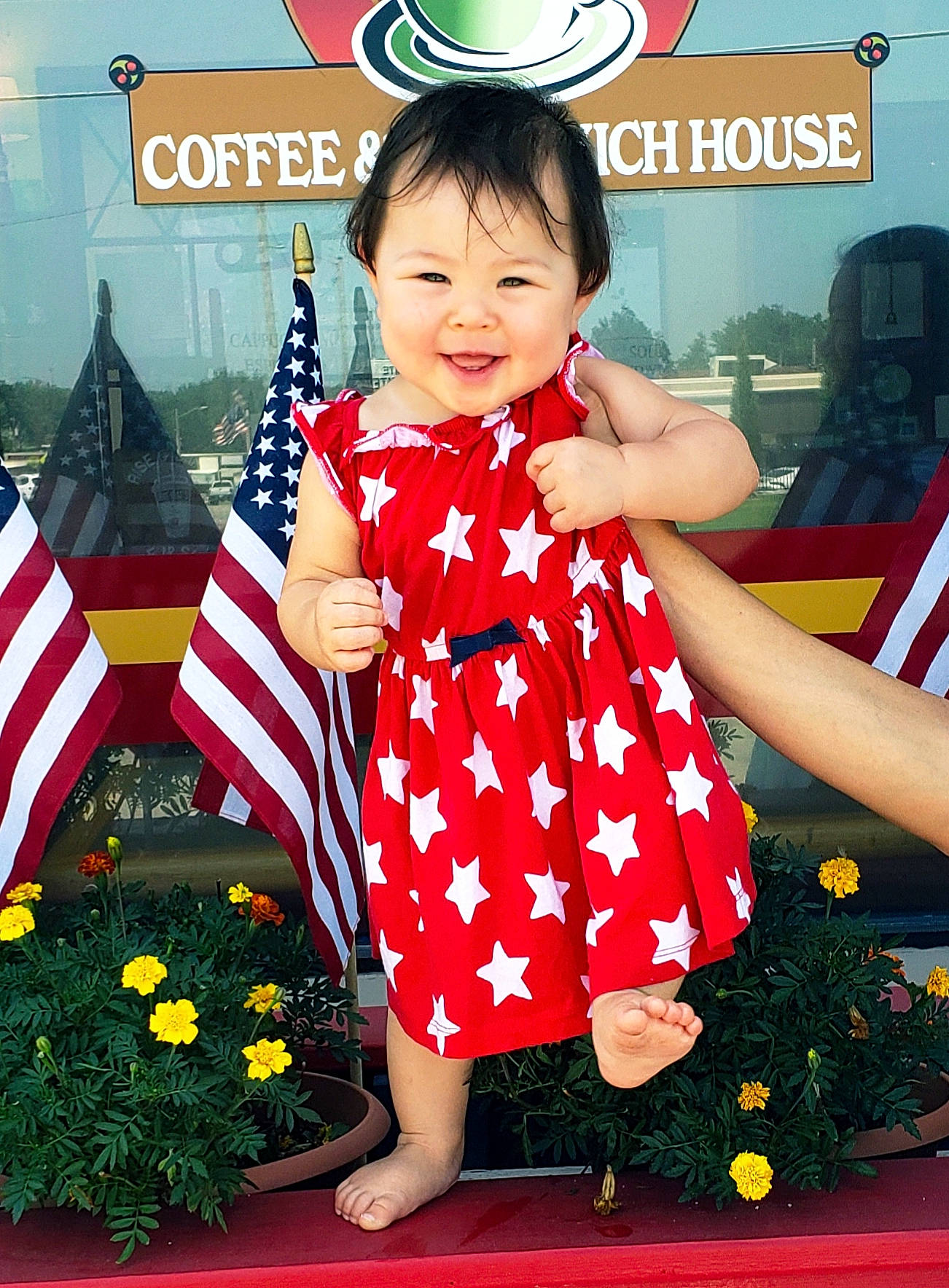 Anika is registered to the contest to win money with this photo: baby_toddler_clothing, beauty, child, day_dress, dress, event, facial_expression, flag, flag_of_the_united_states, floral_design, flower, formal_wear, fun, happy, joy, one_piece_garment, pattern, person, petal, sleeve