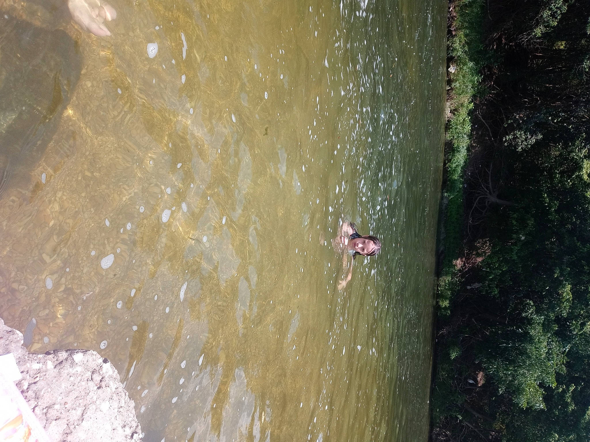 April joined the competition — help win amazing prizes! adventure, bedrock, body_of_water, extreme_sport, formation, landscape, mineral_spring, person, plant, recreation, rock, soil, spring, terrestrial_plant, tree, trunk, water, water_feature, watercourse, wind_wave