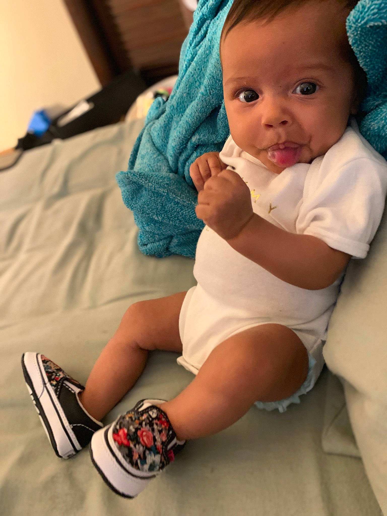 Jaylani joined the competition — help win amazing prizes! baby, cheek, child, finger, leg, mouth, person, sitting, skin, smile, toddler