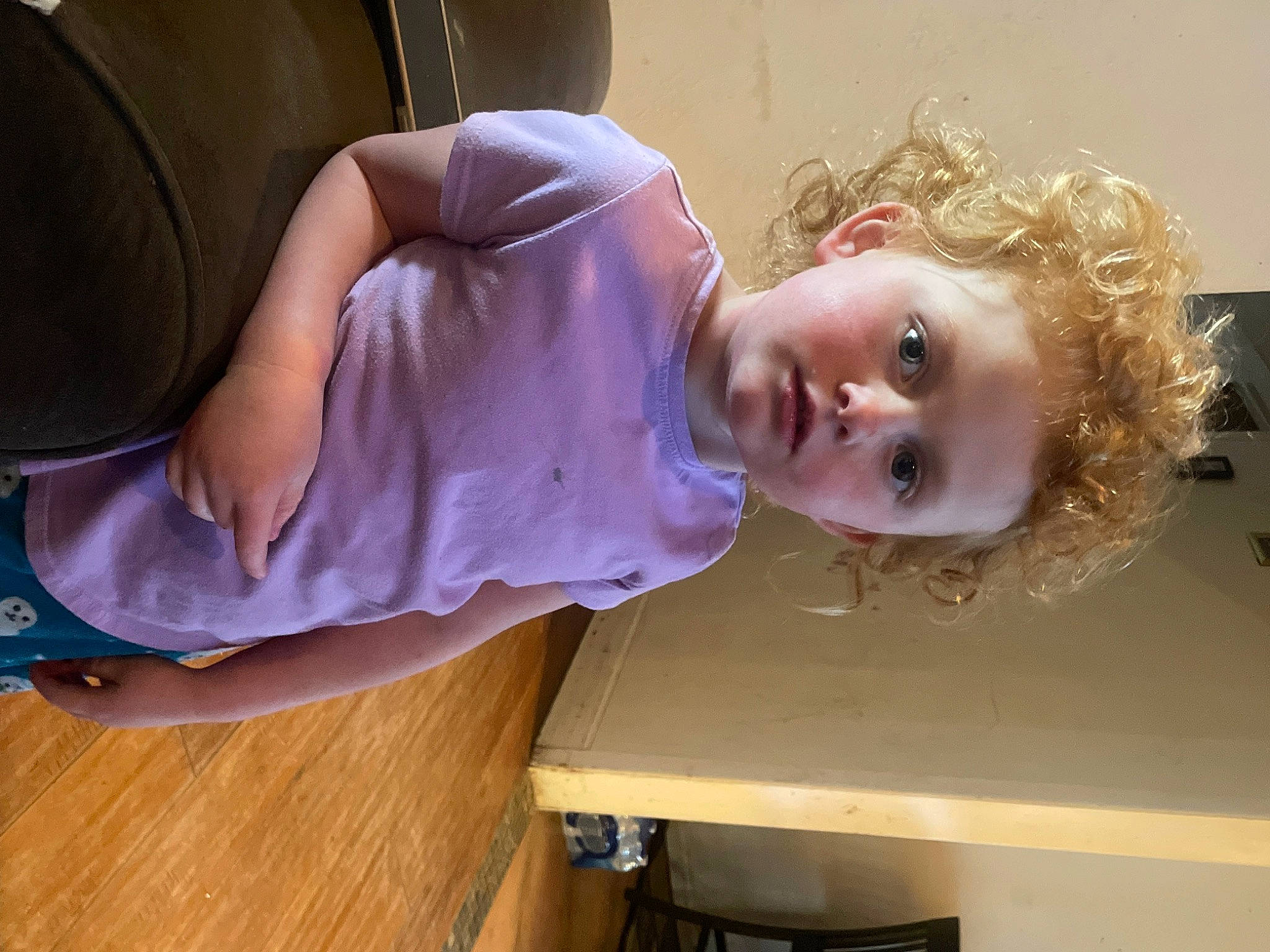 Paisley joined the competition — help win amazing prizes! baby, child, comfort, dress, flooring, fun, happy, hardwood, human_leg, knee, person, room, sitting, table, thigh, toddler, vehicle_door, wood