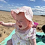 baby, child, beach, sunhat, towel, sand, sky, clouds, smiling, happy, summer, outdoor, cute, infant, clothing, sunny, playful, portrait, sitting, daylight