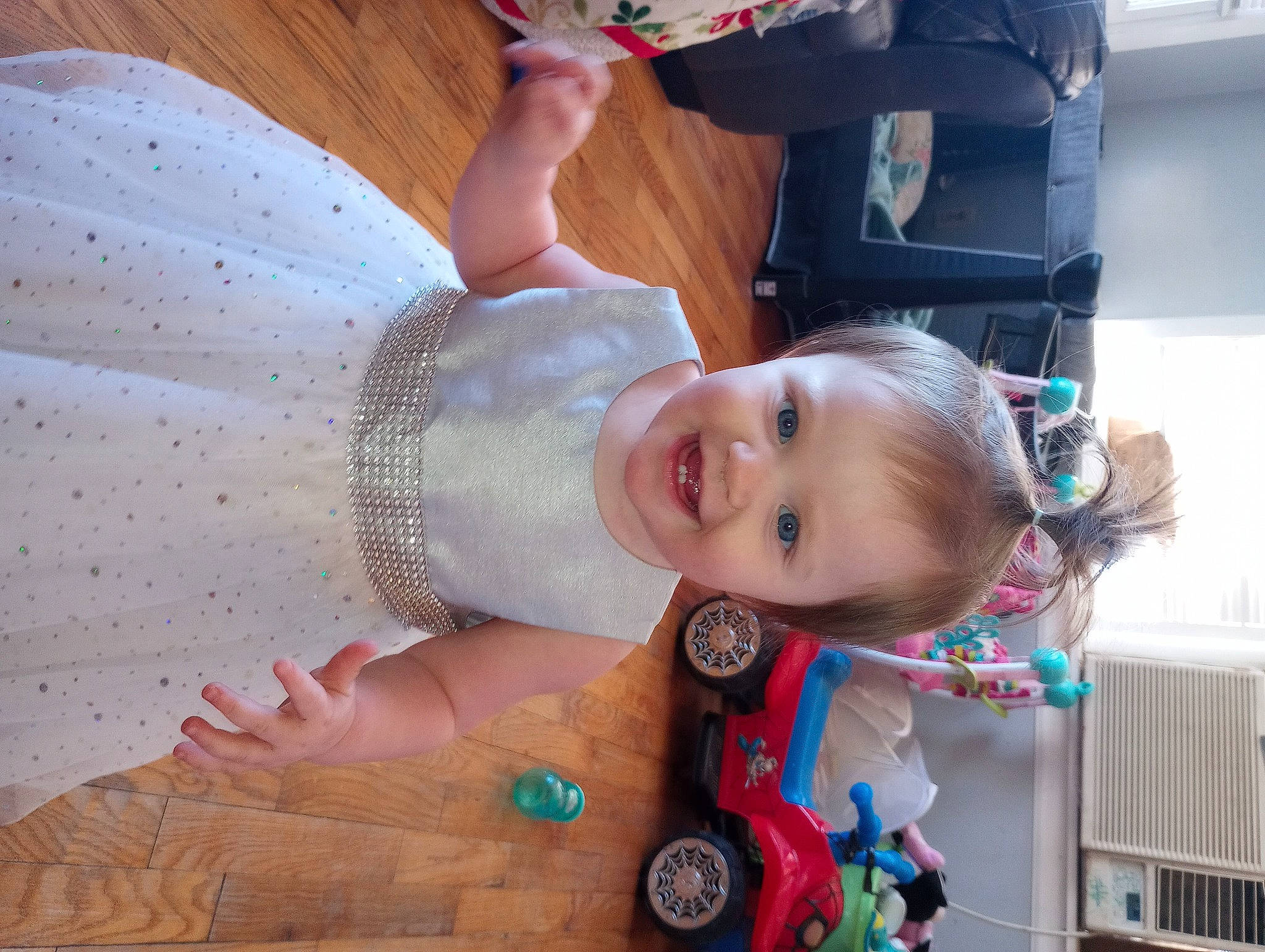 Jasmine is registered to the contest to win money with this photo: baby, baby_products, baby_toddler_clothing, cheek, child, finger, fun, hand, happy, joy, pattern, person, photograph, pink, product, room, skin, smile, snapshot, toddler