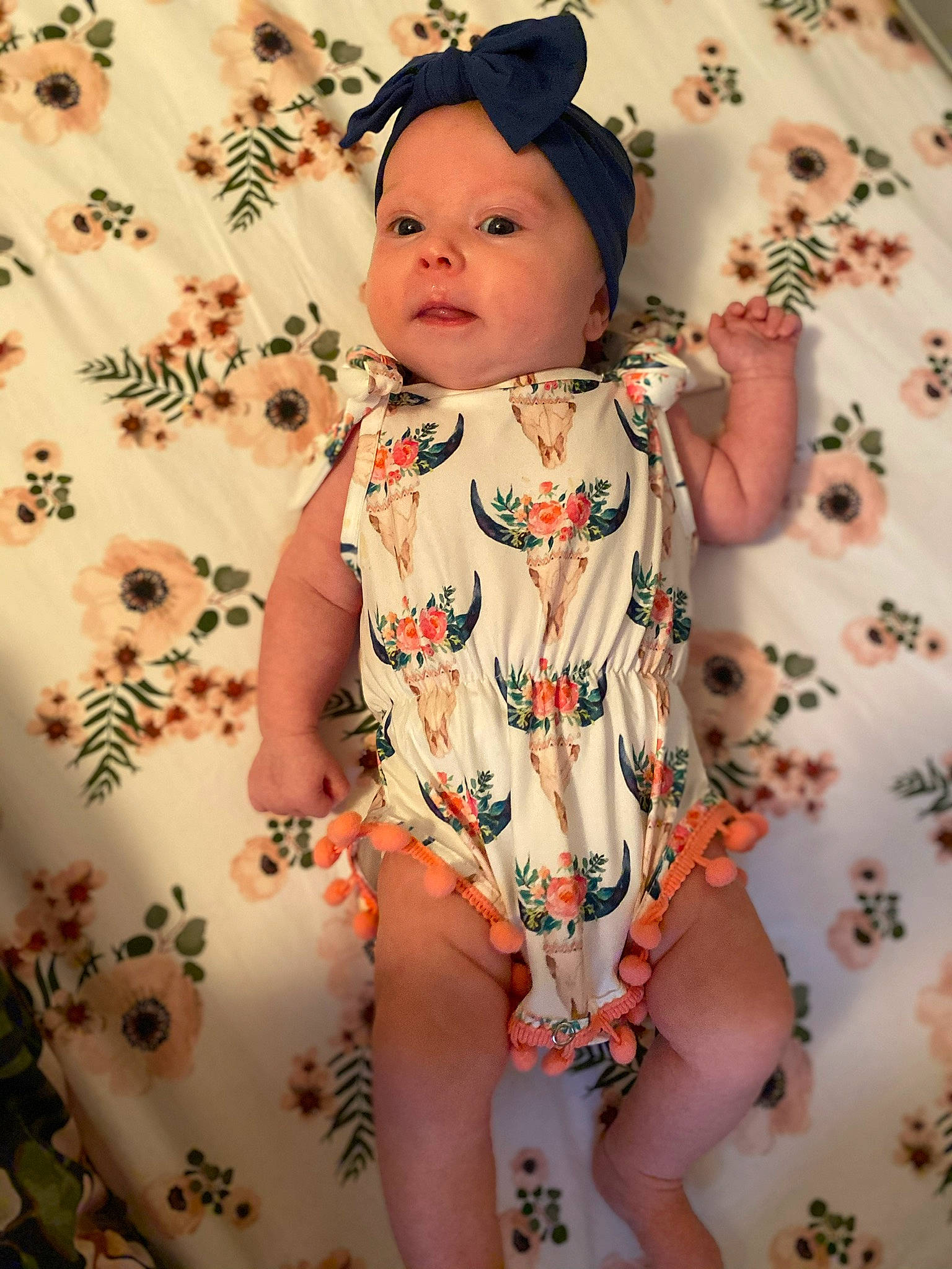 Mckinlee joined the competition — help win amazing prizes! baby, baby_toddler_clothing, cheek, child, clothing, dress, hair_accessory, headpiece, headwear, pattern, peach, person, pink, sleeve, toddler