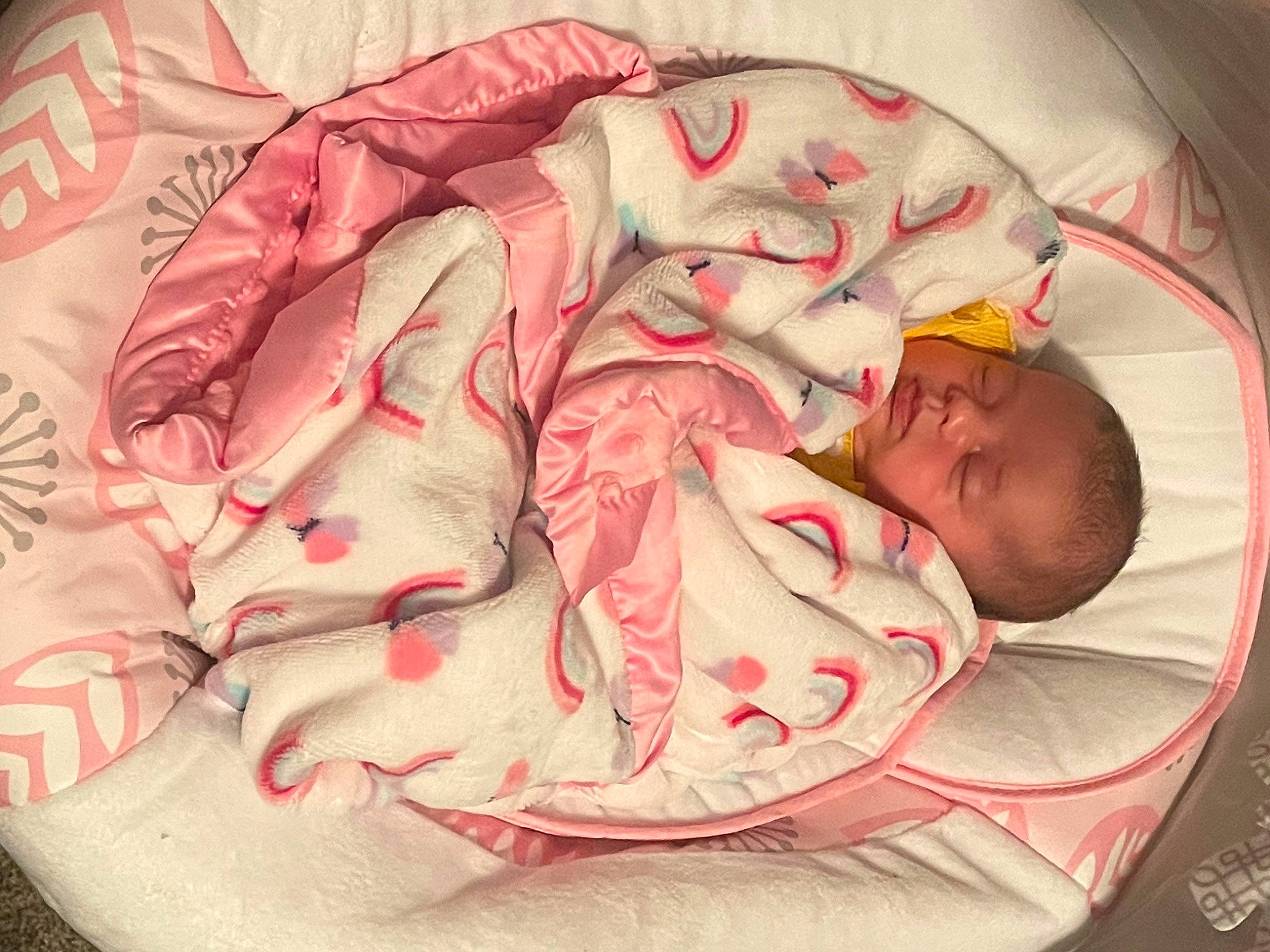 Cassidy is registered to the contest to win money with this photo: baby, baby_products, baby_safety, baby_sleeping, baby_toddler_clothing, bed, bedding, bedtime, carmine, child, comfort, headgear, infant_bed, linens, nap, pattern, person, pink, sleeve, textile