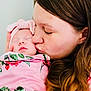 Christlynn is registered to the contest to win money with this photo: baby, child, woman, kiss, love, affection, sleeping, blanket, floral, pink, face, headwear, portrait, closeup, skin, hair, motherhood, tenderness, family, caring