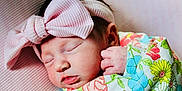 Christlynn joined the competition — help win amazing prizes! baby, newborn, sleeping, headband, bow, pink, blanket, floral, colorful, hand, face, soft, cute, infant, portrait, skin, rest, peaceful, lying, closeup