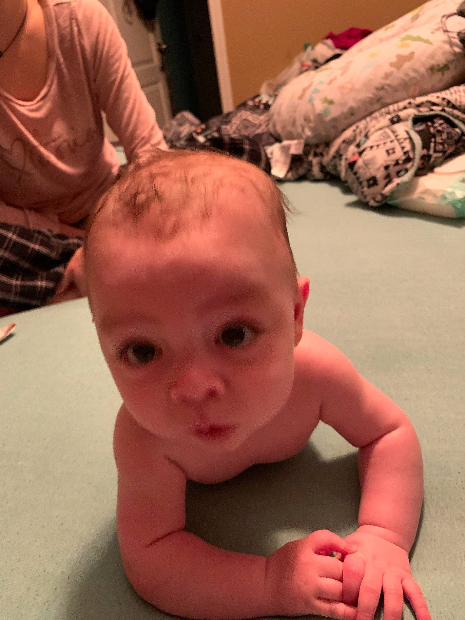 Leo is registered to the contest to win money with this photo: arm, baby, cheek, chest, child, crawling, ear, face, forehead, head, mouth, nose, person, skin, toddler