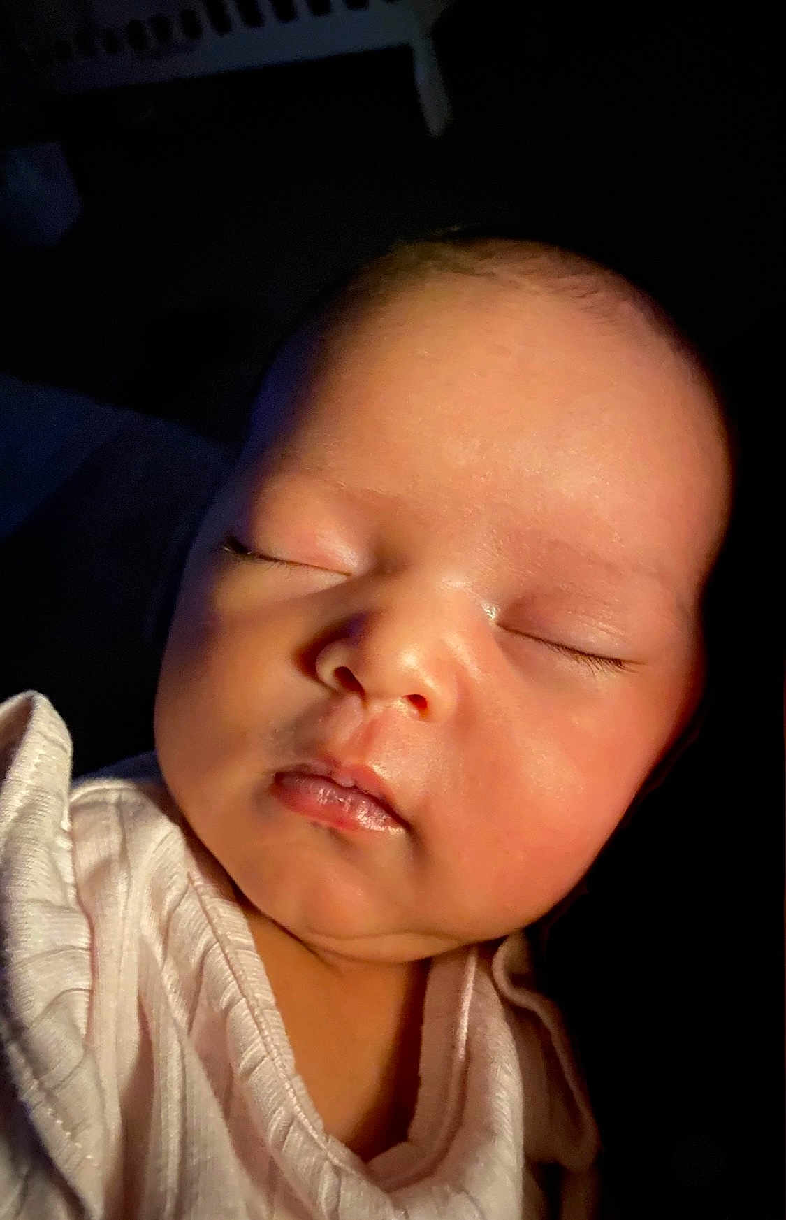 Gracelynn is registered to the contest to win money with this photo: baby, sleeping, infant, face, closeup, skin, newborn, peaceful, soft_light, portrait, child, cozy, white_clothing, cute, resting, indoor, young, human, calm, adorable