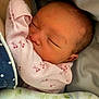 Gracelynn is registered to the contest to win money with this photo: newborn, baby, sleeping, infant, face, pink_clothing, blanket, cozy, closeup, peaceful, skin, cute, child, soft, toddler, rest, indoors, portrait, warm, calm