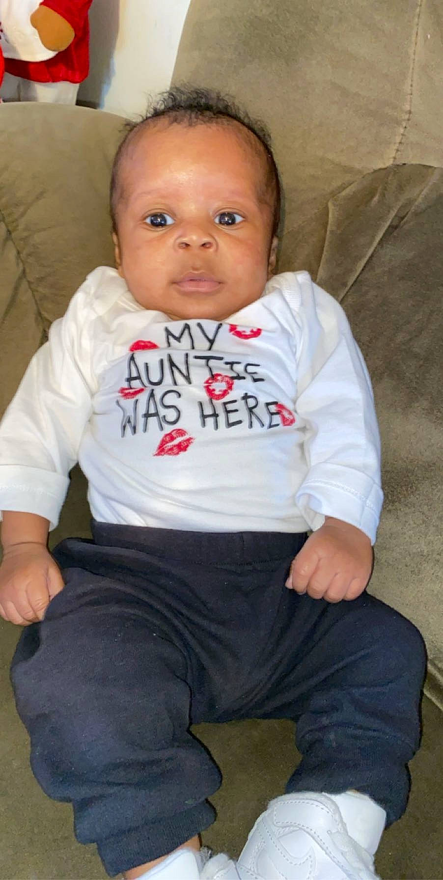 Kymani is registered to the contest to win money with this photo: baby, baby_toddler_clothing, cheek, child, person, sitting, toddler