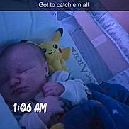 Graysun joined the competition — help win amazing prizes! baby, infant, sleeping, crib, nursery, pikachu, stuffed_toy, plush_toy, blanket, pajamas, bedtime, indoors, portrait, close_up, face, hand, cozy, blue_lighting, text_overlay, night