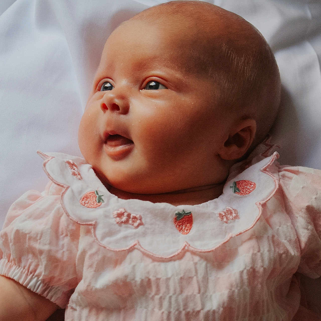 Isla joined the competition — help win amazing prizes! baby, babylaughing, bodypart, clothing, dress, face, finger, frown, hand, happy, head, newborn, person, photography, portrait, sad, smile