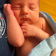 Easton joined the competition — help win amazing prizes! newborn, baby, sleeping, infant, blanket, blue_blanket, hand, face, peaceful, resting, person, clothing, skin, closeup, portrait, indoor, soft_light, caring, tender, holding