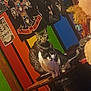 Lil Baby is registered to the contest to win money with this photo: animal, black_and_white_cat, cat, colorful_wall, cozy, decor, feline, furniture, guns_n_roses, indoor, pets, posters, relaxed, room, sitting, striped_cat, tabby_cat, table, vibrant_colors, wall_art