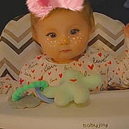 River joined the competition — help win amazing prizes! baby, high_chair, pajamas, hearts, love, face_filter, pink_bunny_ears, freckles, toy, babyjoy, child, infant, cute, indoor, portrait, seated, playful, expression, young, adorable