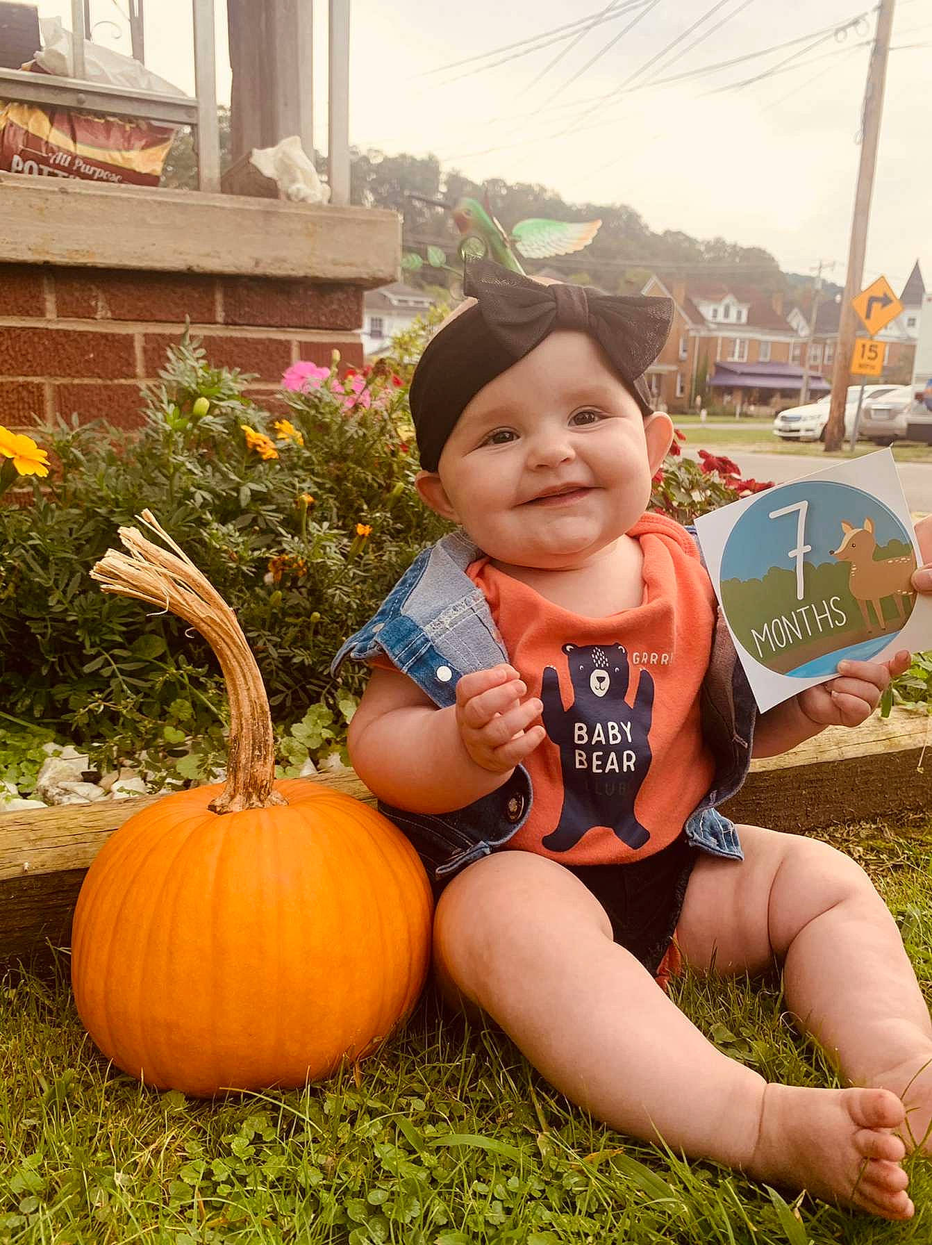Peyton is registered to the contest to win money with this photo: baby_toddler_clothing, calabaza, cucurbita, gourd, grass, happy, hat, headwear, joy, leaf, leg, natural_foods, people_in_nature, person, photograph, plant, pumpkin, shorts, sky, smile