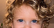 Mason is registered to the contest to win money with this photo: baby, blond, blue_eyes, child, closeup, curly_hair, cute, expression, eyelashes, face, hair, happy, indoor, light, person, portrait, skin, smiling, toddler, young_child