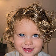 Mason joined the competition — help win amazing prizes! child, toddler, smile, curly_hair, blue_eyes, face, portrait, happy, young_child, indoors, cute, person, blond_hair, closeup, baby, expression, headshot, innocent, skin, cheerful