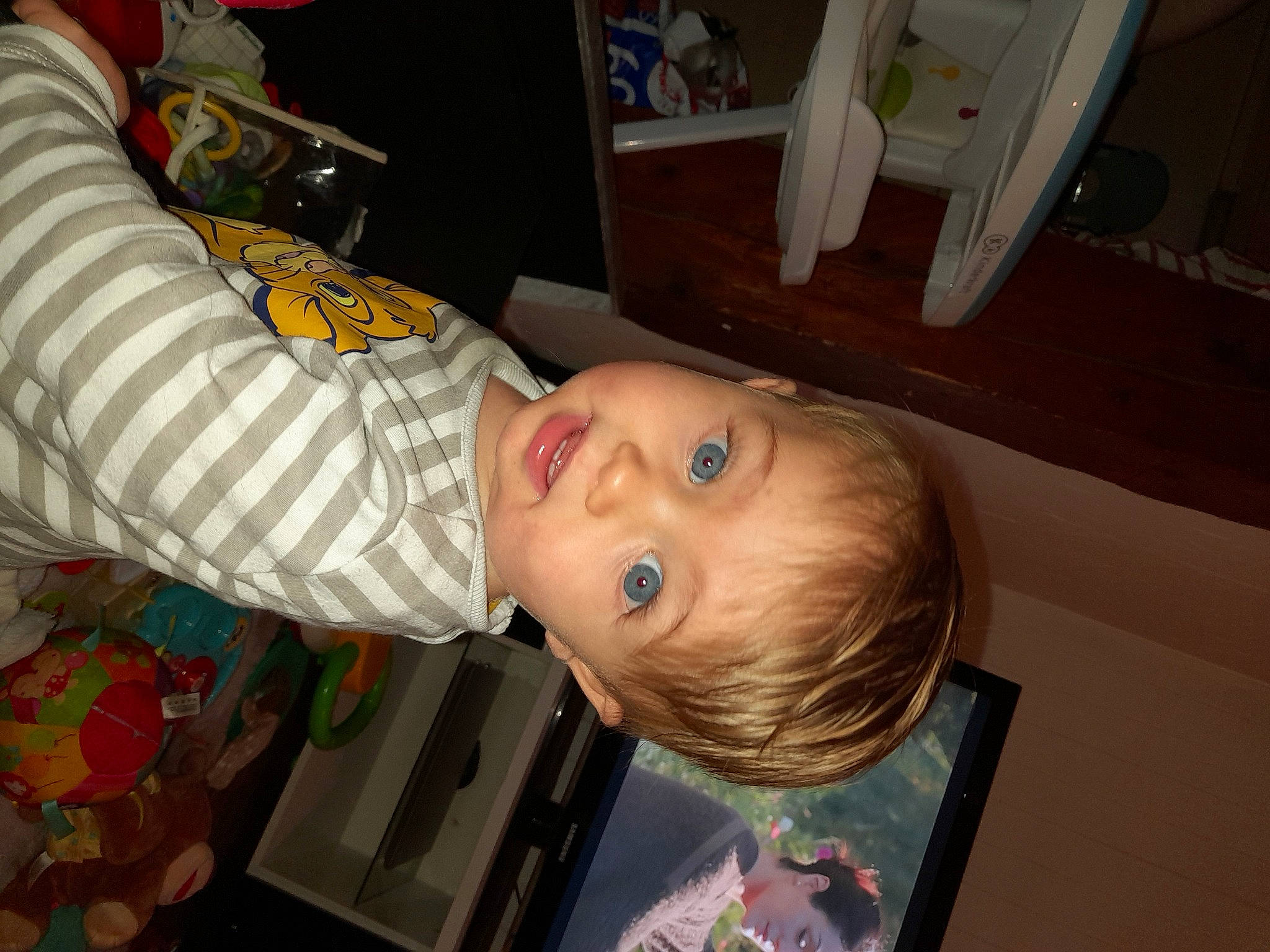 Milio a rejoint le concours — aidez-le/la à gagner de superbes lots ! arm, baby, cheek, child, cooking, ear, flooring, fun, mouth, person, room, toddler