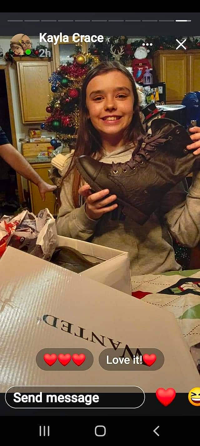 Alicia Gibson is registered to the contest to win money with this photo: beauty, box, camera, christmas, christmas_decoration, christmas_ornament, christmas_tree, community, event, eyewear, fashion, fun, happy, holiday, interior_design, joy, ornament, person, room, smile