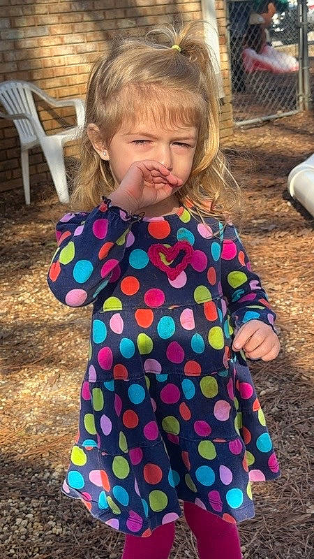 Lisa is registered to the contest to win money with this photo: baby_toddler_clothing, child, dress, electric_blue, facial_expression, fun, grass, hair, hairstyle, happy, leisure, mammal, pattern, people, person, pink, sleeve, summer, t_shirt, toddler