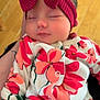 baby, sleeping, headband, bow, floral, onesie, red, pink, flower, pattern, infant, closeup, hand, wooden_floor, soft_lighting, peaceful, portrait, child, cute, indoors