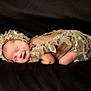 newborn, baby, sleeping, infant, lace, bonnet, delicate, floral, soft, black_background, peaceful, cute, portrait, closeup, resting, adorable, tiny, skin, headwear, child