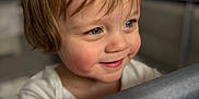 Kylo joined the competition — help win amazing prizes! baby, blue_eyes, blurred_background, child, close_up, clothing, cute, fabric, face, grip, hair, hand, happy, indoor, person, portrait, skin, smiling, soft_light, toddler