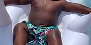 Jhream is registered to the contest to win money with this photo: barefoot, bubbles, child, floatie, floating, inflatable, leisure, necklace, outdoor, play, pool, relaxation, skin, summer, sunlight, swimming_pool, swimwear, toddler, vacation, water