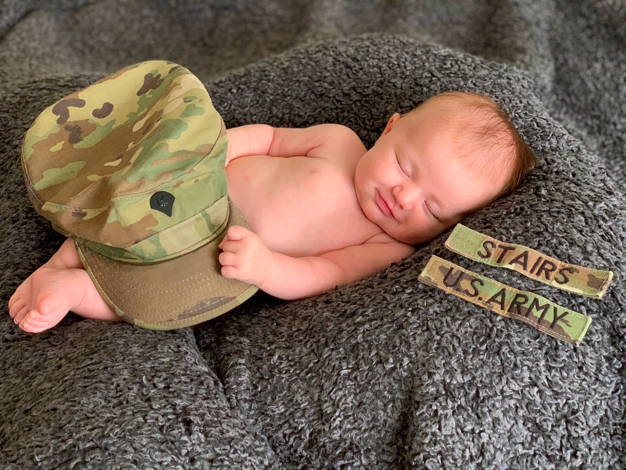 Camryn joined the competition — help win amazing prizes! baby, baseball_cap, camouflage, cap, child, head, headgear, pattern, person, sleep, toddler