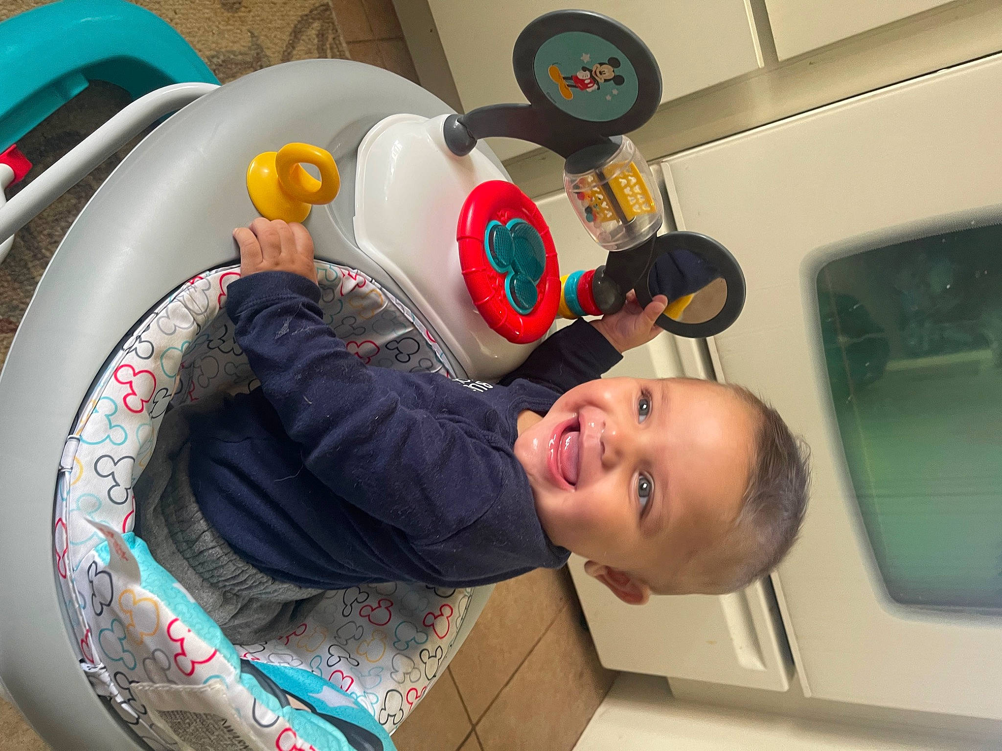 Camdyn is registered to the contest to win money with this photo: audio_equipment, automotive_design, automotive_exterior, automotive_lighting, automotive_wheel_system, child, family_car, fun, happy, joy, leisure, motor_vehicle, person, recreation, room, smile, t_shirt, toddler, toy, vehicle