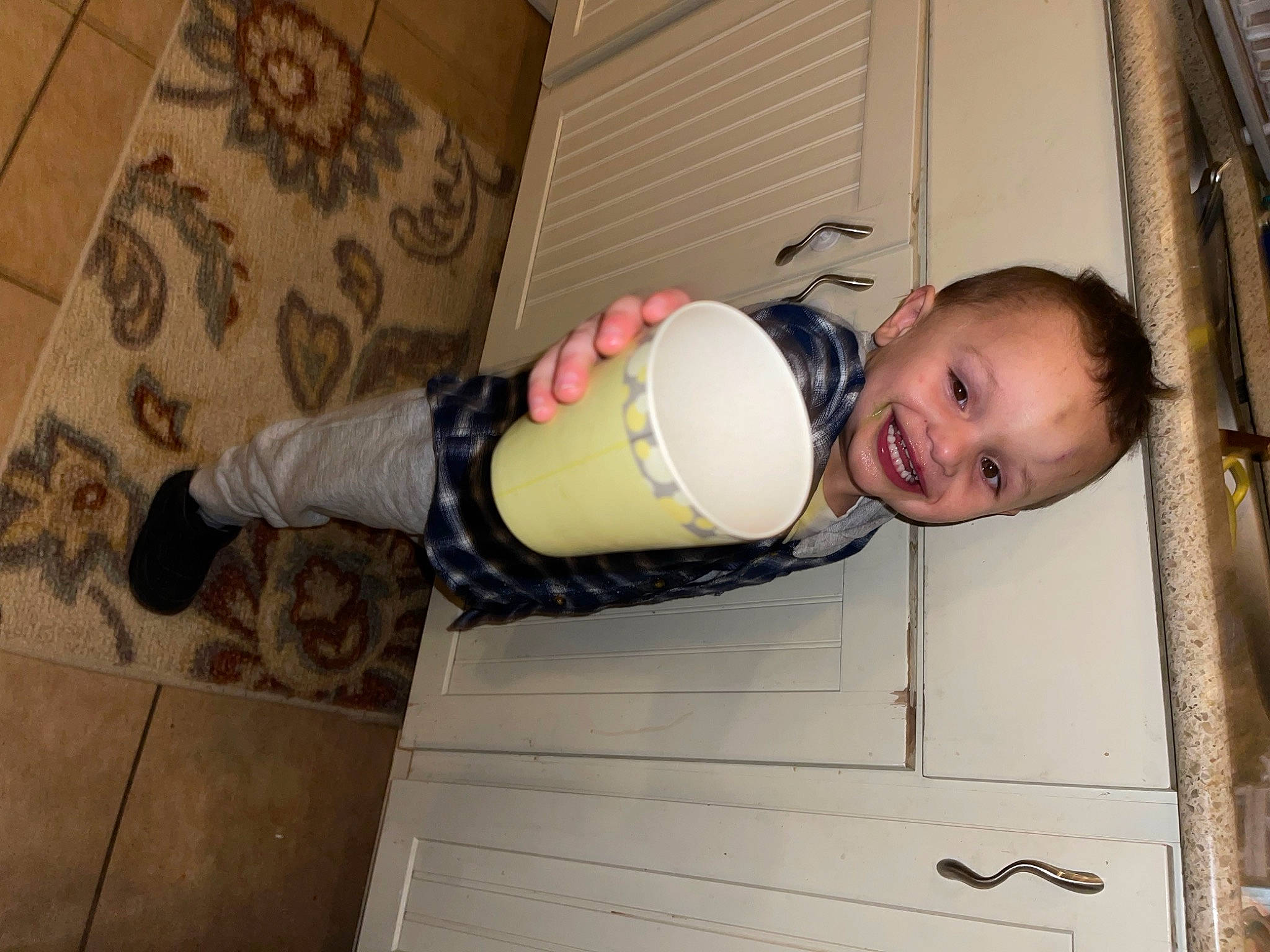 Mason is registered to the contest to win money with this photo: baby, baby_toddler_clothing, ceiling, child, door, elbow, flash_photography, flooring, fun, hardwood, human_leg, joy, knee, pattern, person, room, smile, thigh, toddler, wood