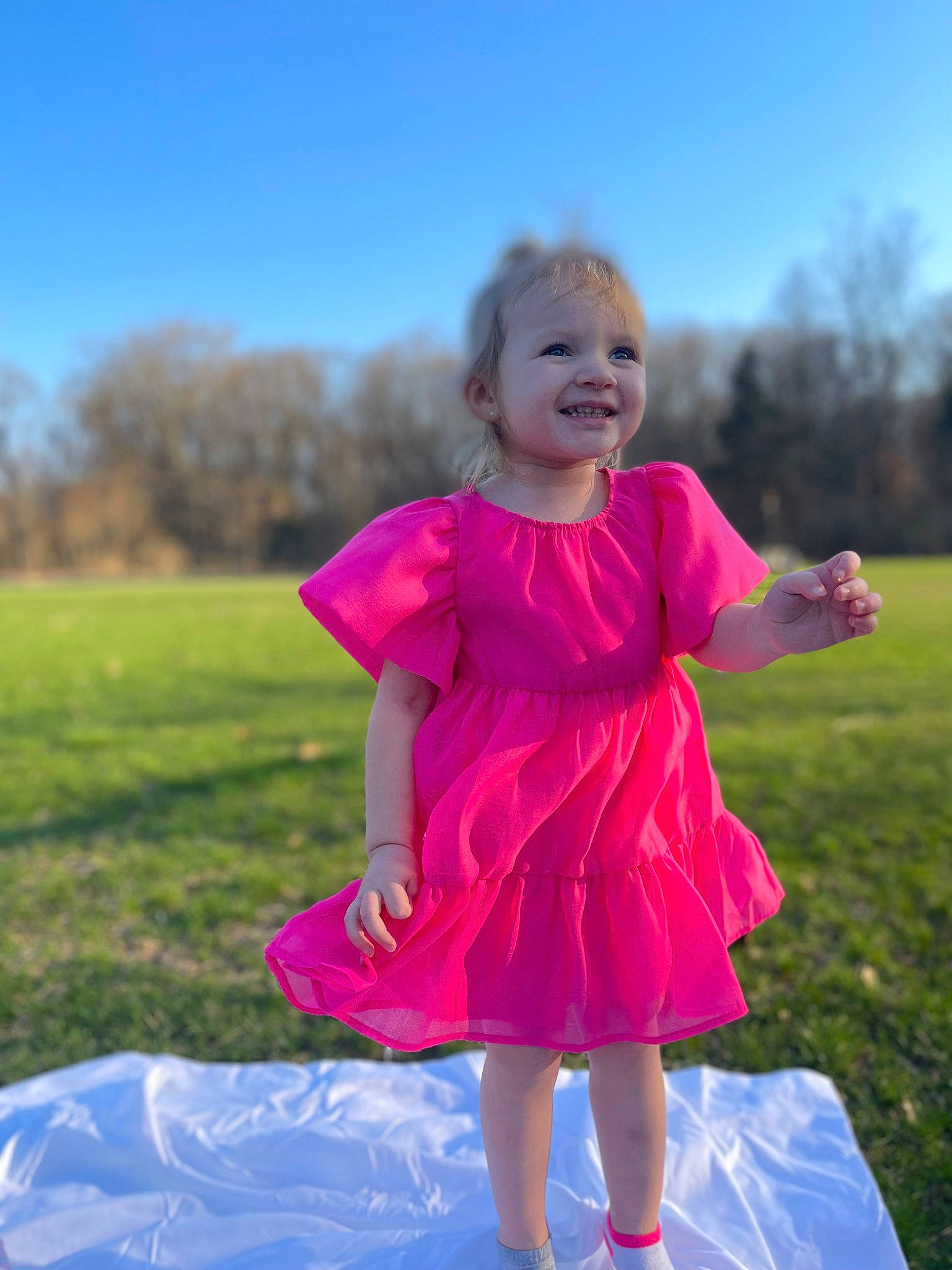 Oakley joined the competition — help win amazing prizes! baby_toddler_clothing, day_dress, dress, event, flash_photography, fun, grass, grassland, happy, joy, leisure, meadow, one_piece_garment, people_in_nature, person, pink, plant, recreation, sky, smile