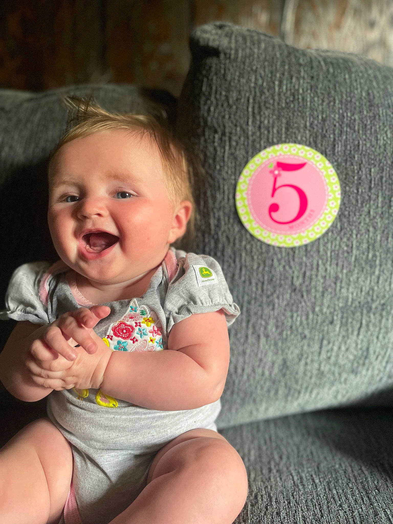 Brylee joined the competition — help win amazing prizes! baby, baby_toddler_clothing, cap, cheek, eye, facial_expression, finger, hand, happy, head, human_body, iris, lip, mouth, nose, organ, person, pink, skin, smile