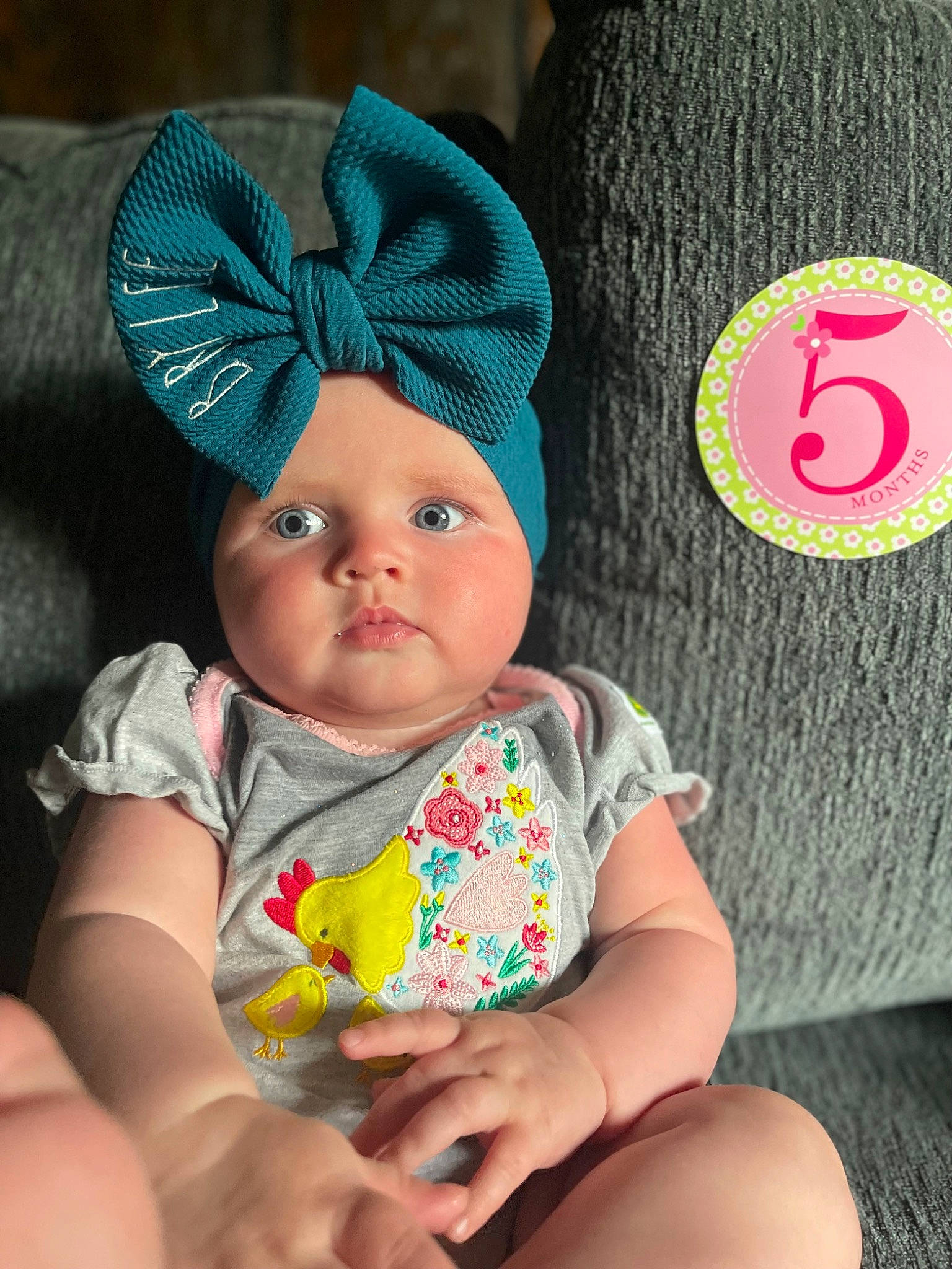 Brylee is registered to the contest to win money with this photo: baby, baby_toddler_clothing, cap, cheek, child, comfort, costume_hat, eye, fashion_accessory, finger, hand, head, headgear, headwear, human_body, linens, mammal, person, skin, sleeve