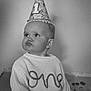Jessie joined the competition — help win amazing prizes! baby, child, party_hat, birthday, sweater, one, earrings, portrait, celebration, cute, indoor, confetti, monochrome, black_and_white, infant, face, expression, knitted, young_child, curious