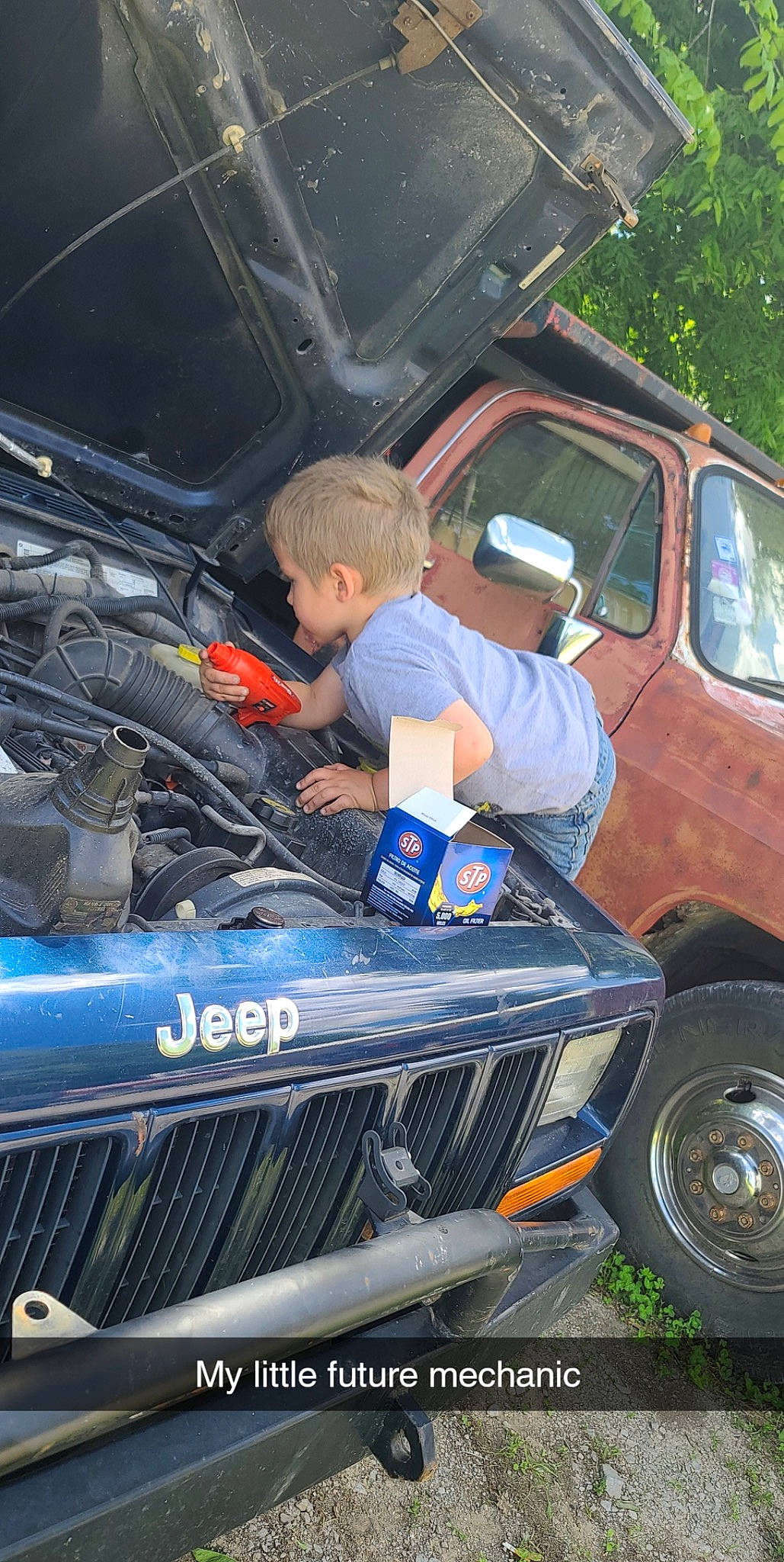 Jensen is registered to the contest to win money with this photo: auto_part, automotive_design, automotive_exterior, automotive_tire, automotive_wheel_system, bumper, car, fender, hood, mode_of_transport, motor_vehicle, person, rim, shorts, t_shirt, tire, tread, vehicle, vehicle_door, wheel